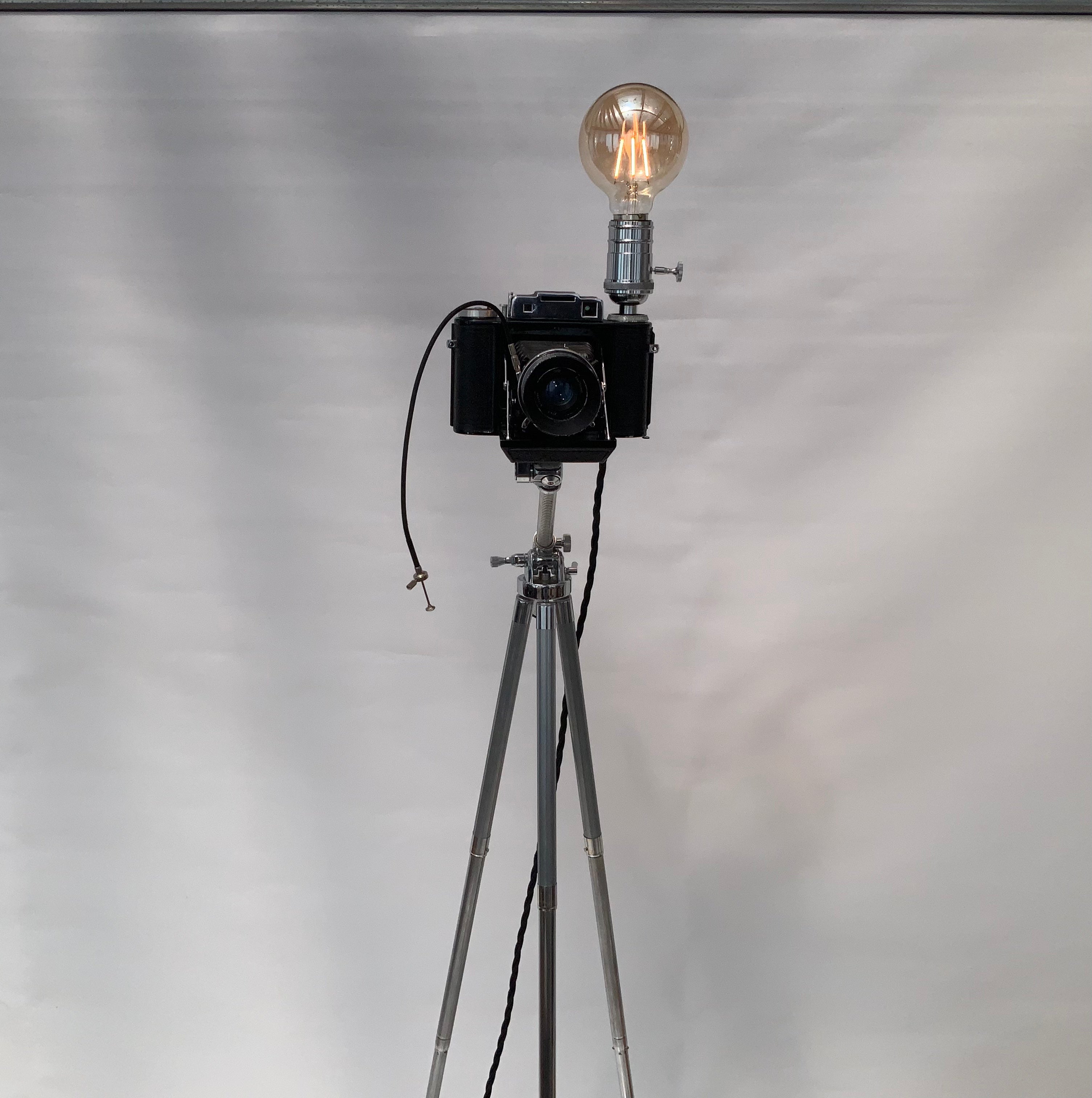 British Made 1950s Agifold Camera Repurposed into a stunning camera lamp.