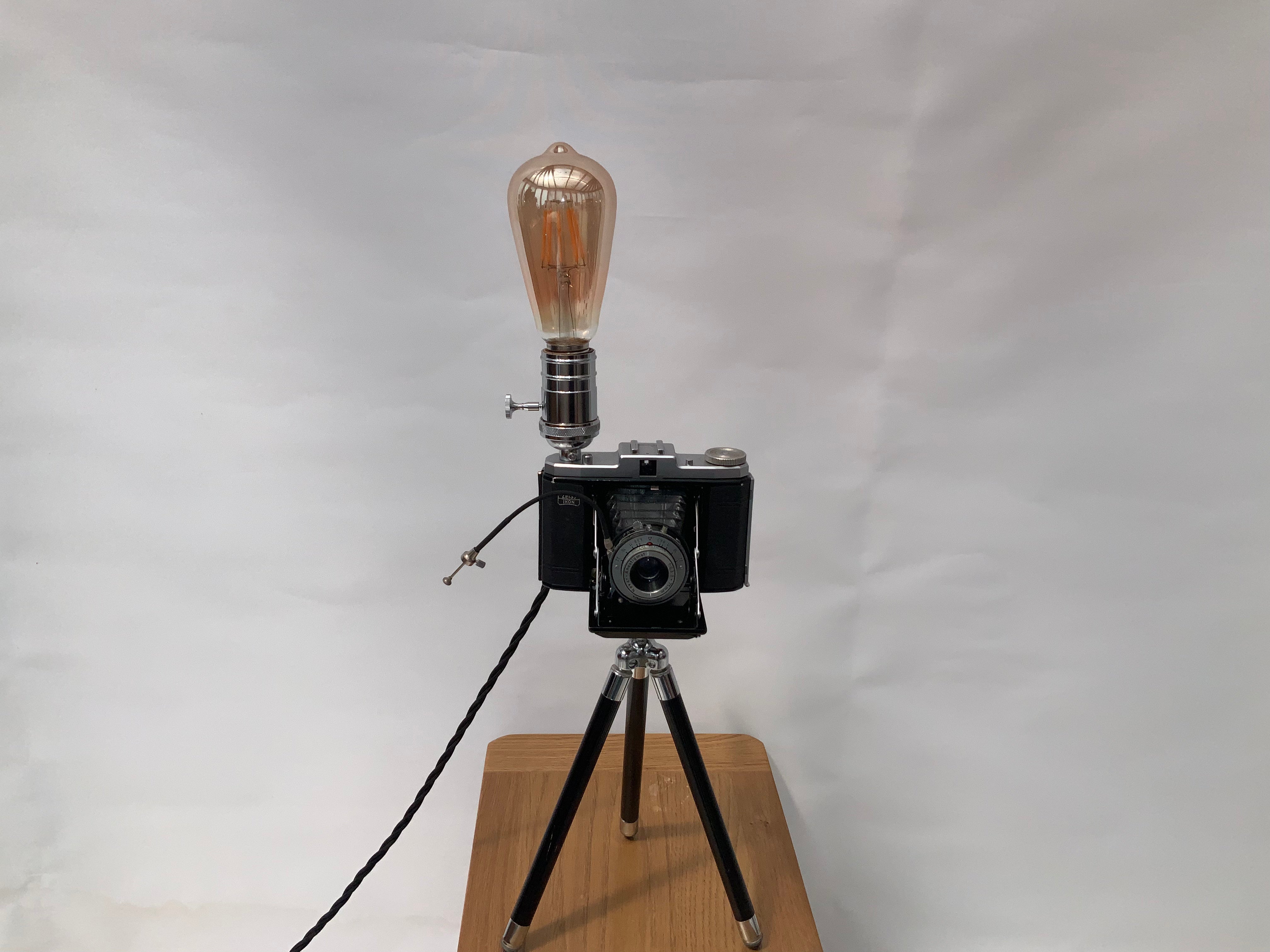 German Made 1950s Zeiss Icon Nettar repurposed into a stunning camera lamp.